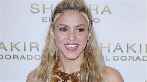 shakira sexy|Shakira looks unrecognisable in tiny metallic bikini and knee.